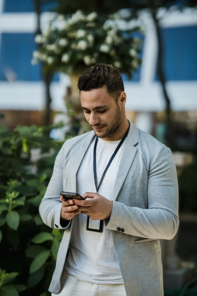Practitioner looking at his phone by Marker Marketing